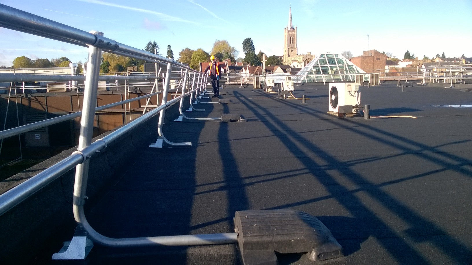 Roof barriers fixed to building roof. 
